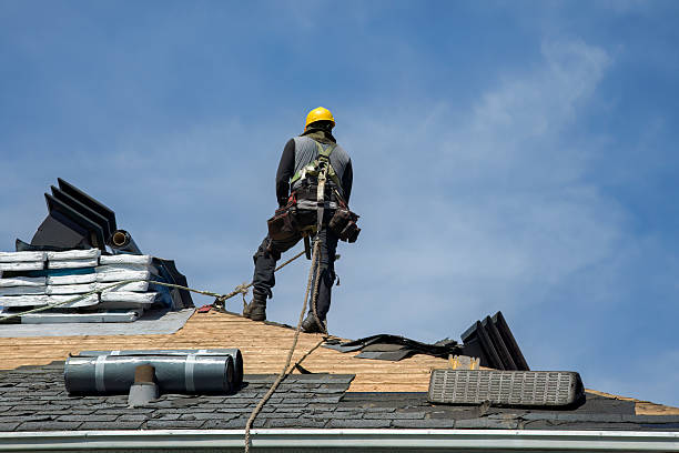 Professional Roofing technician working in Raymond, NH